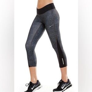NIKE animal print size medium leggings with drawstring reflective, capri